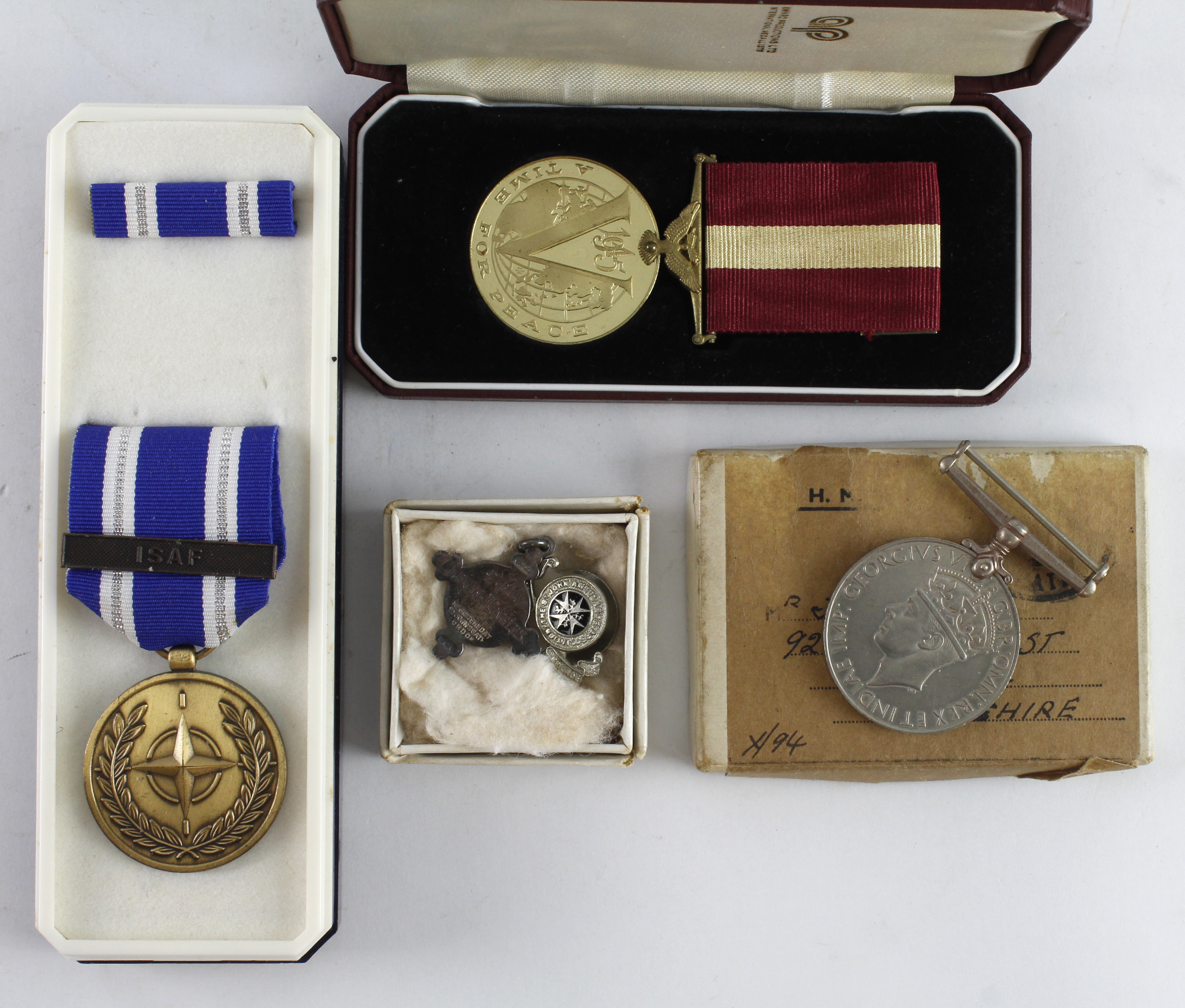 Medals including WW2 Peace medal in case, WW2 War medal in named box, WW2 Defence medal in named box