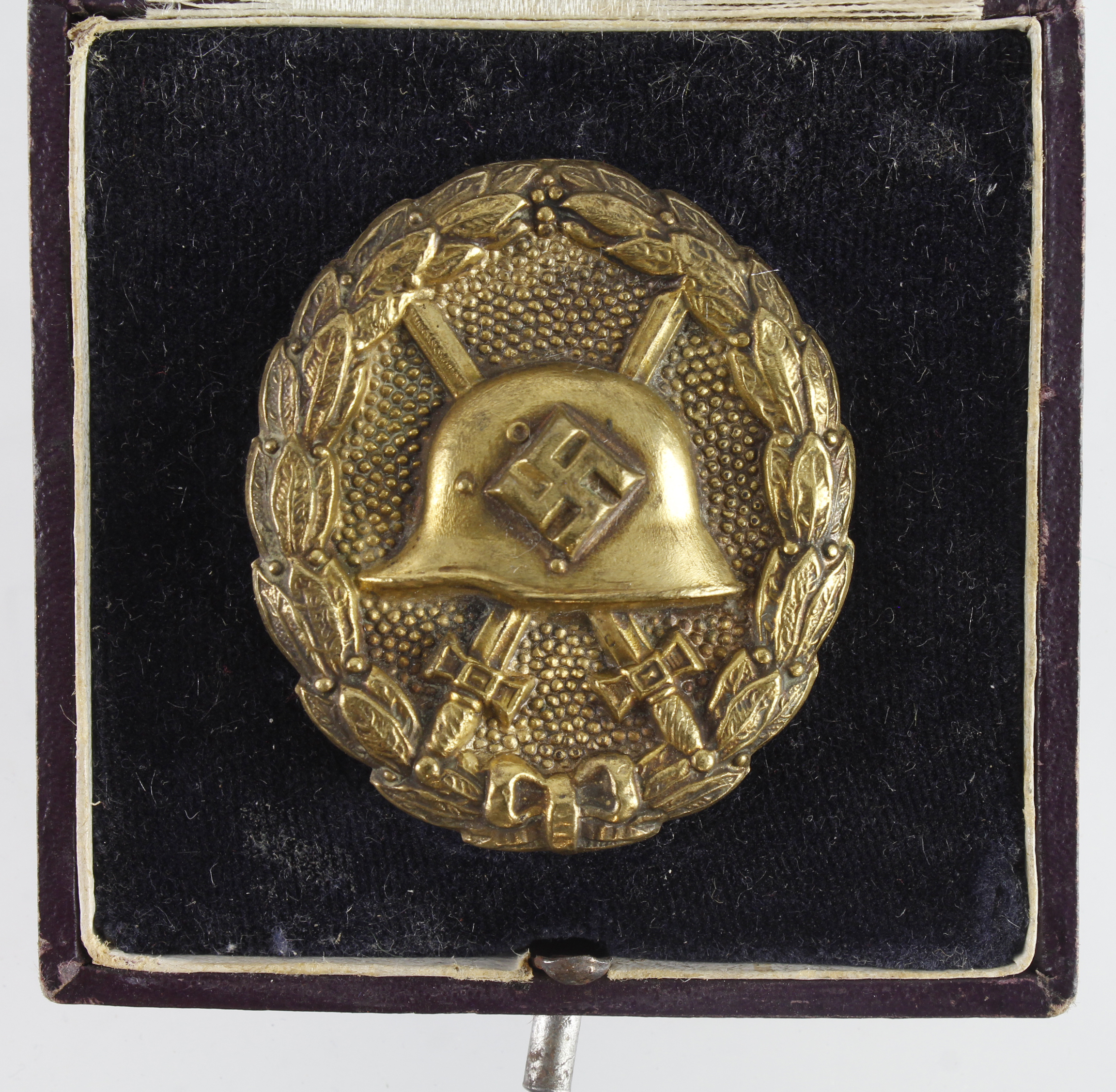 German from a one owner collection a Wounds badge for Spnish Civil War in gold, cased.