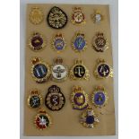 Badges a card of EIIR Canadian cap badges 18x different inc Officers.