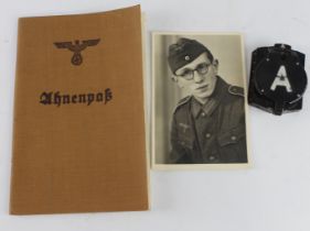 German WW2 pocket compass with a family tree book and photo.