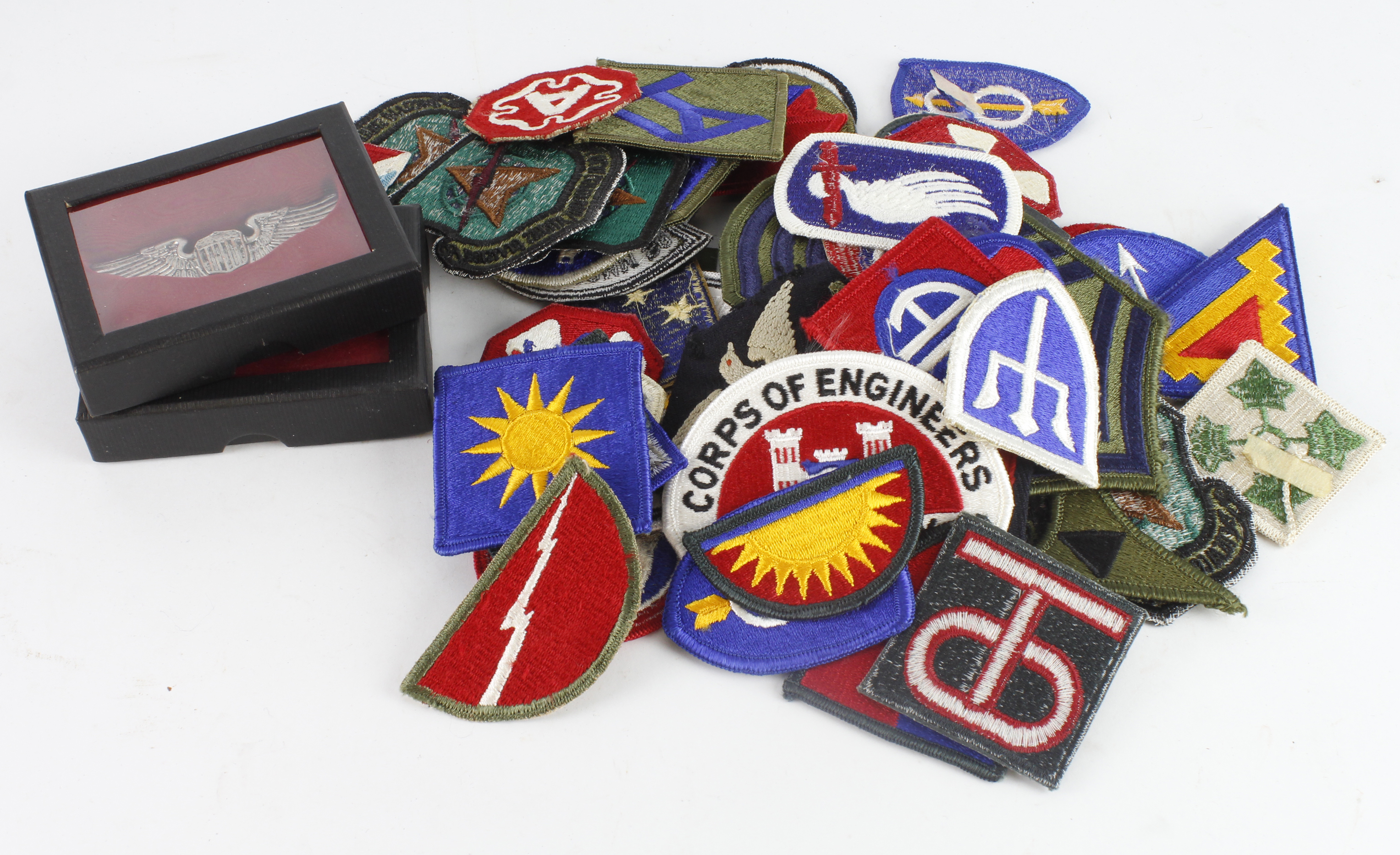 American a selection of cloth rank and trade or unit patches.