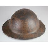 WW1 British Brodie steel helmet nice paint patina no lining but still has full chin strap.