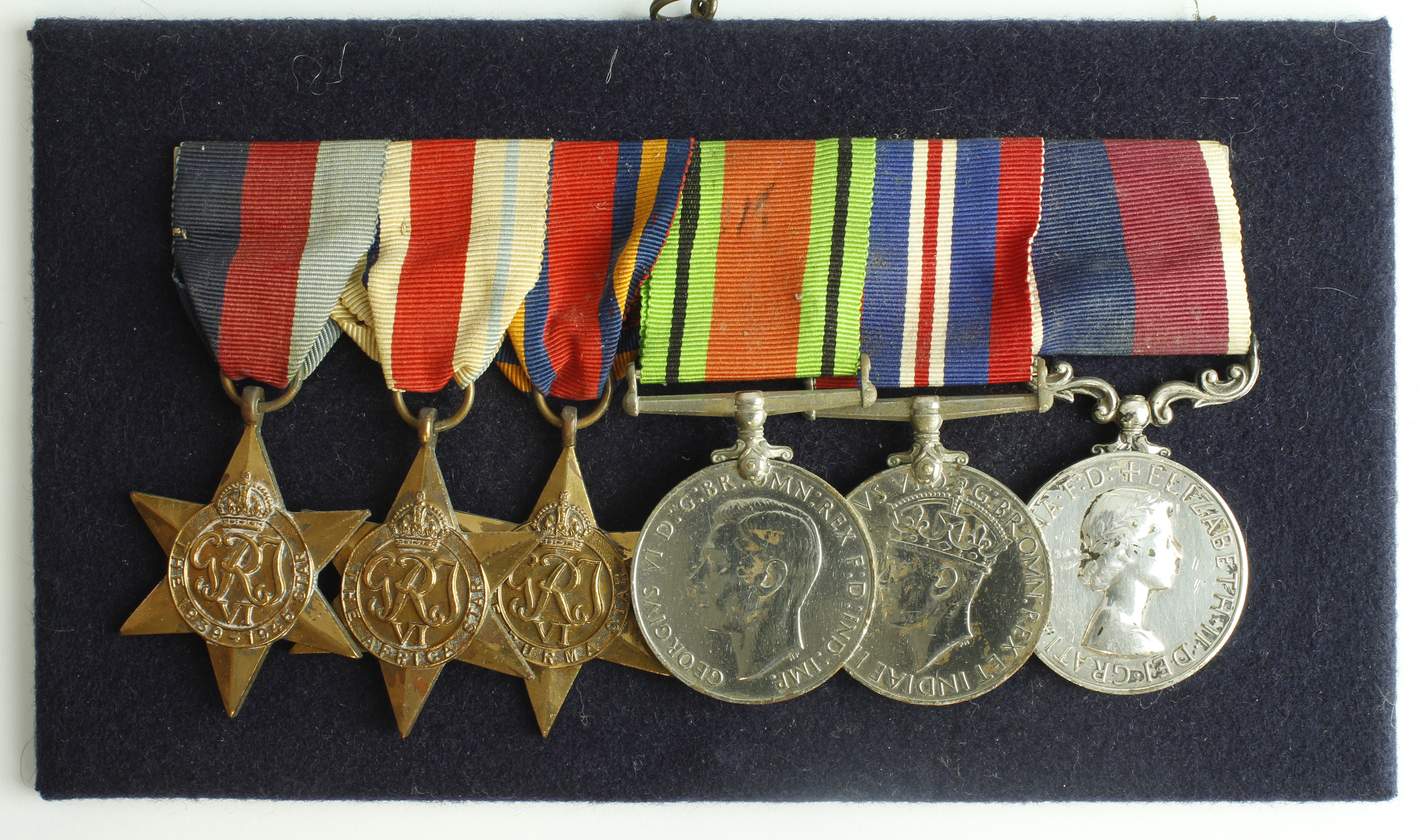 Group mounted as worn - 1939-45 Star, Africa Star, Burma Star, Defence & War Medal, QE2 RAF LSGC