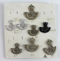Badges DLI small card of Durham Light Infantry cap and Beret badges 8x.