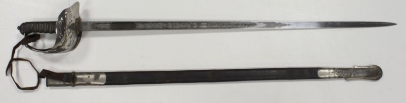 Sword with QV bowl shaped guard, and EDVII cypher to blade. Maker marked Henry Wilkinson, and