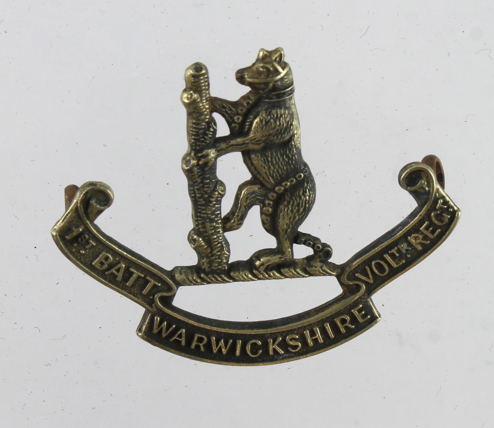 Cap badge 1st Batt. Warwickshire Vol. Regt.