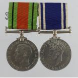 Police LSGC Medal GVI (Const Thomas E. Brailsford) and Defence Medal. Served Birmingham City Police.