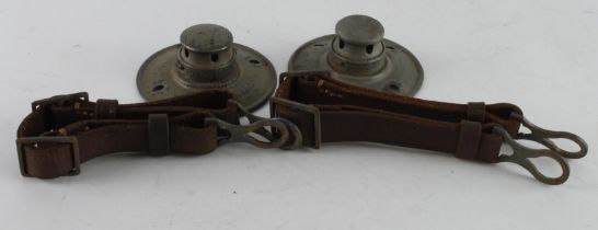 German WW1 Pickelhaube top plates two of with two German Pickelhaube or helmet chin straps.