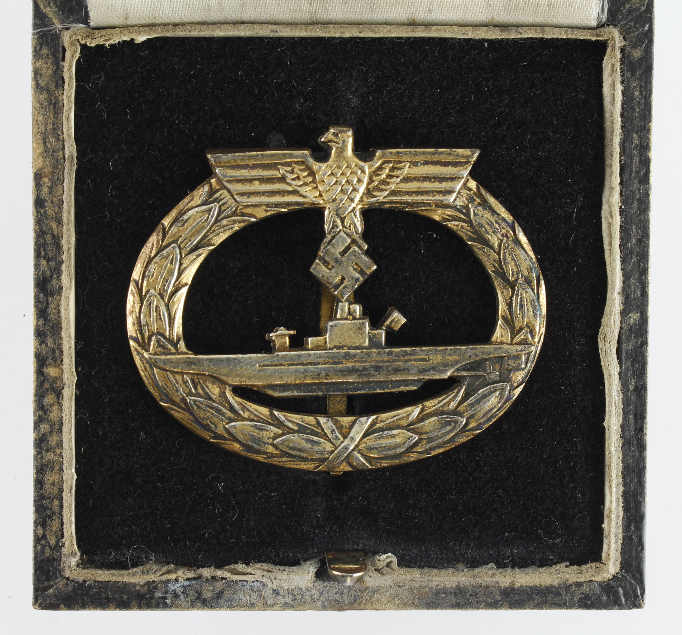 German from a one owner collection, a U-Boat service badge, stamped L/19 in fitted case.