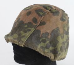 German Waffen SS Camo Helmet cover a scarce type with draw string. Possibly locally produced in