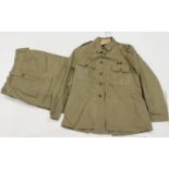 Desert/Gallipoli uniform a Khaki drill tunic and shorts WW1 or just after, various issue stamps