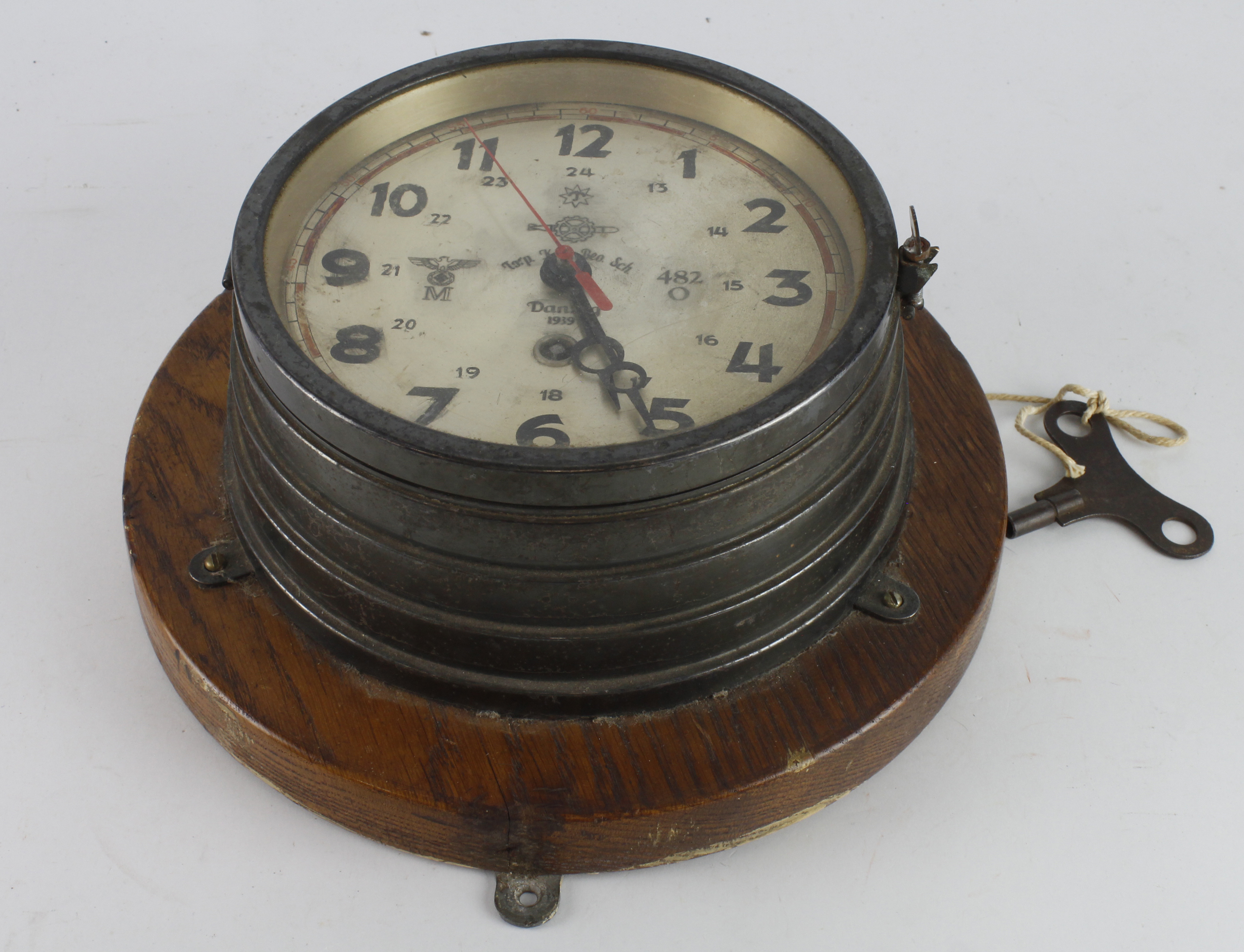 German 3rd Reich Kreigsmarine Clock with key. Dial marked 'Danzig 1939, Torp Kdo Beo Sch' and '