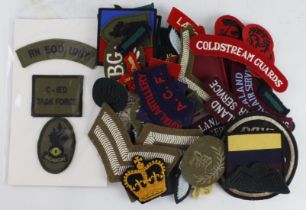 Badges a selection of cloth mostly British & Empire army types.