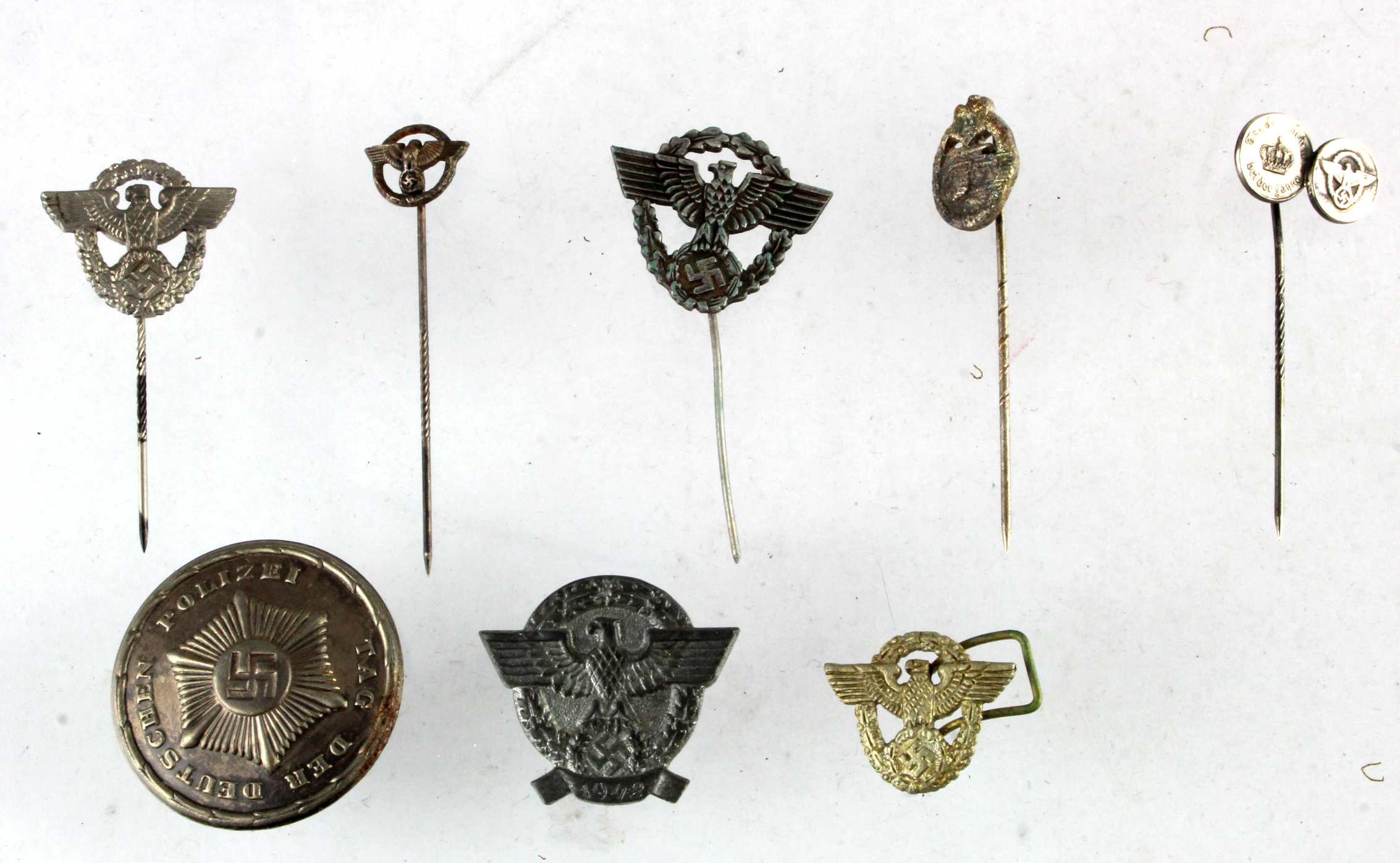 German WW2 stick pins badges a collection of eight mostly police.