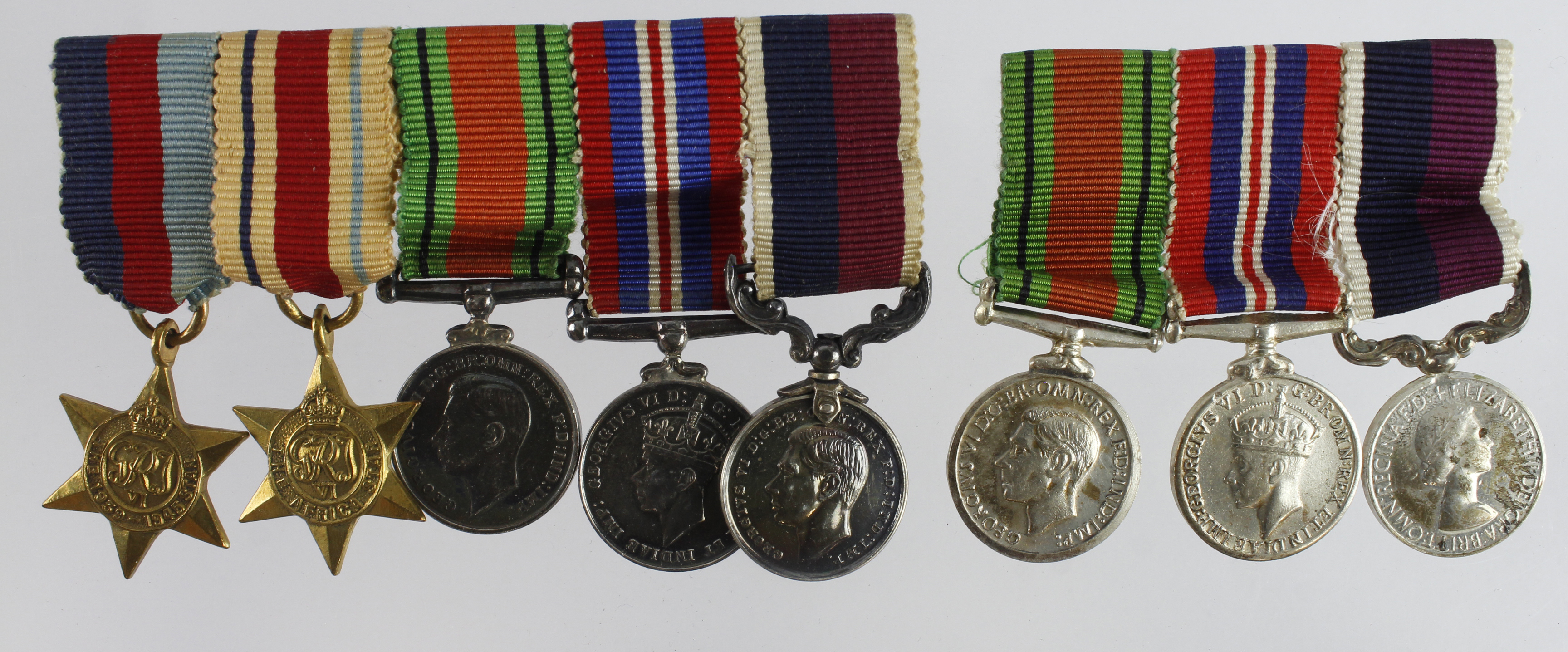 Minature Medal groups mounted as worn - Defence & War Medal + QE2 RAF LSGC Medal. Plus 1939-45 Star,