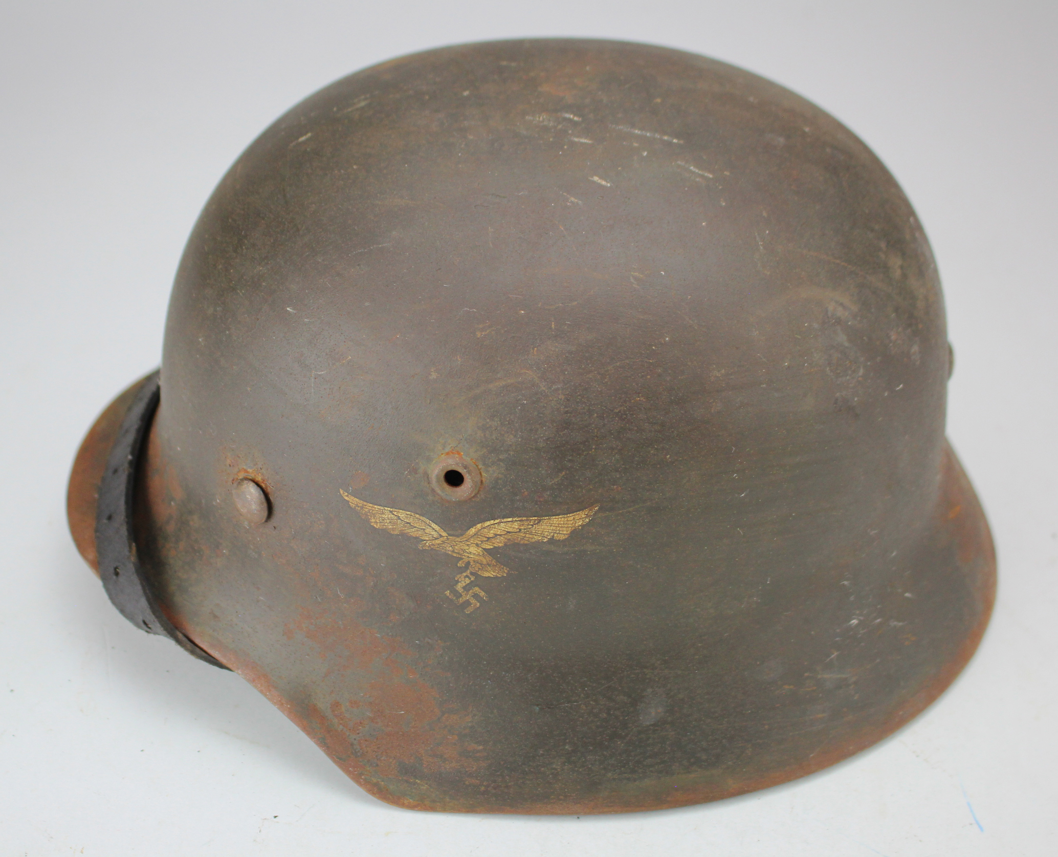 German Luftwaffe M35 single decal combat helmet, complete with liner and chinstrap, number 1575 on