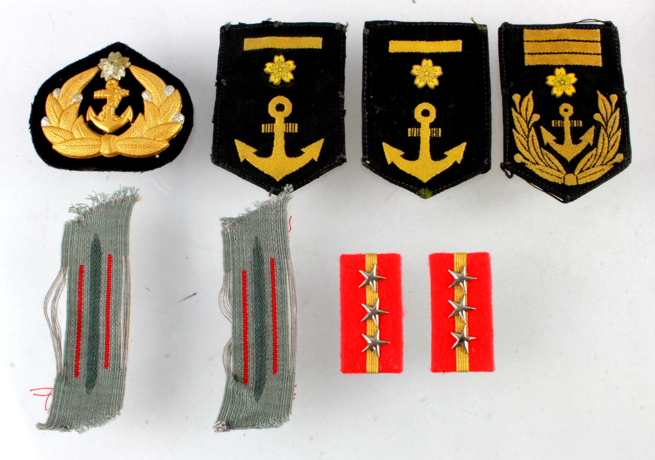 Japanese WW2 collection of six naval rank badges.