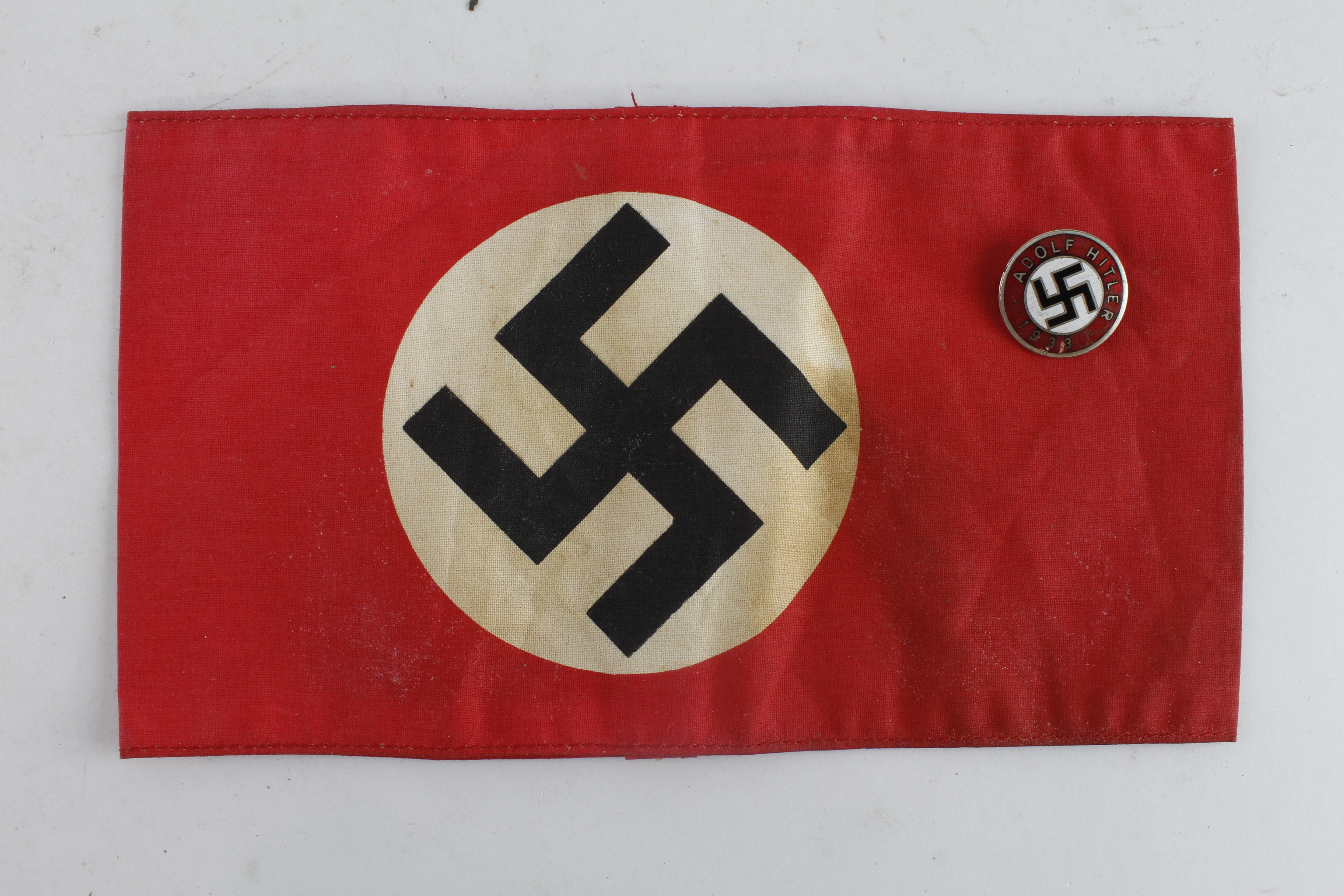 Germany NSDAP Party armband, printed, and lapel badge.