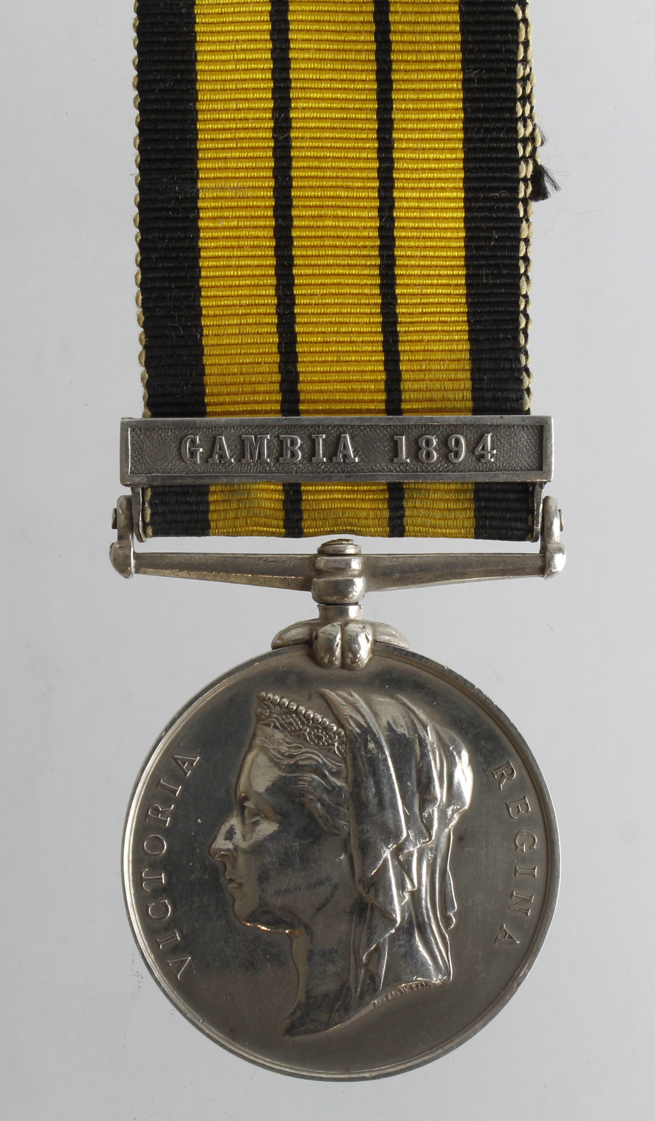 East and West Africa Medal 1892 with Gambia 1894 clasp, neatly erased. Sold as seen