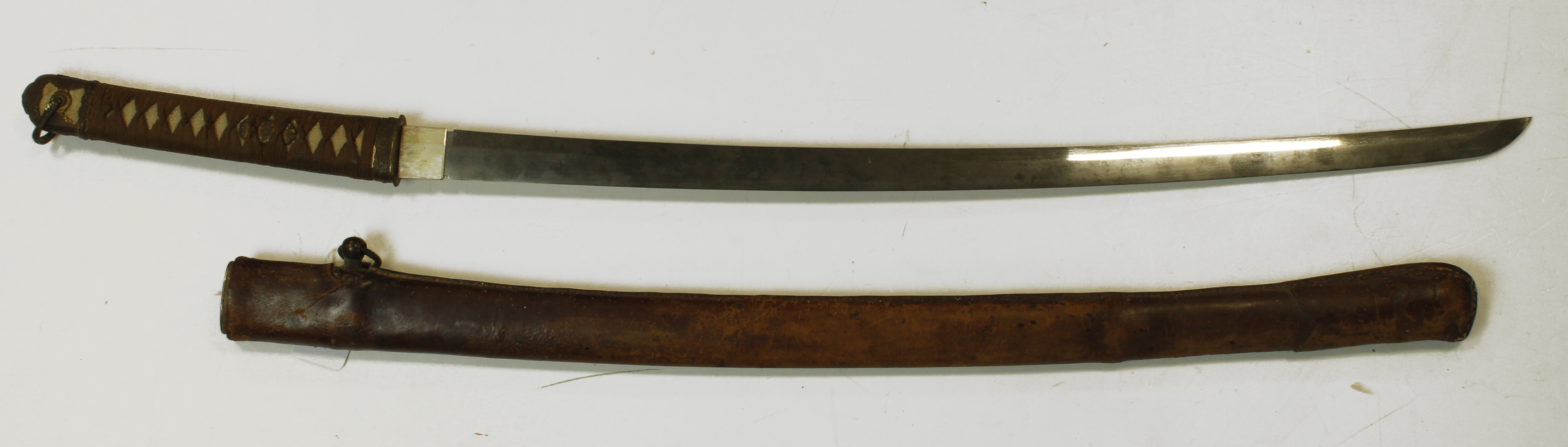 Japanese Sword with scabbard and leather cover, tang signed, blade approx 26"
