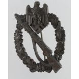 German from a one owner collection a Wehrmacht war badge Infantry Assault in heavy form.