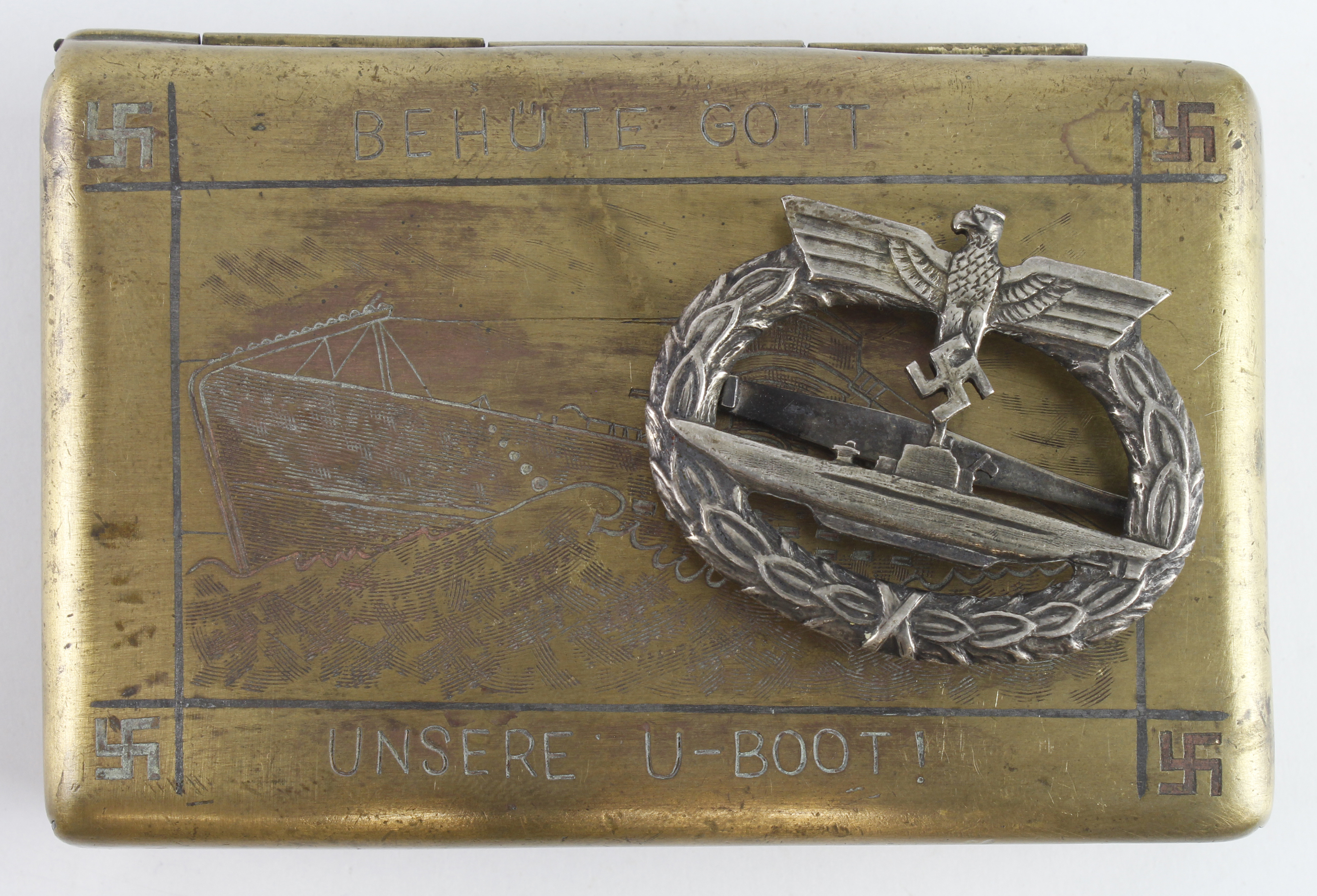 Germany from a one owner collection, a U Boat badge and a brass U Boat interest box with U-Boat