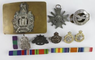 Mixed lot of militaria comprising KOSB brass & white metal buckle, 4 collar badges, an ATC badge,