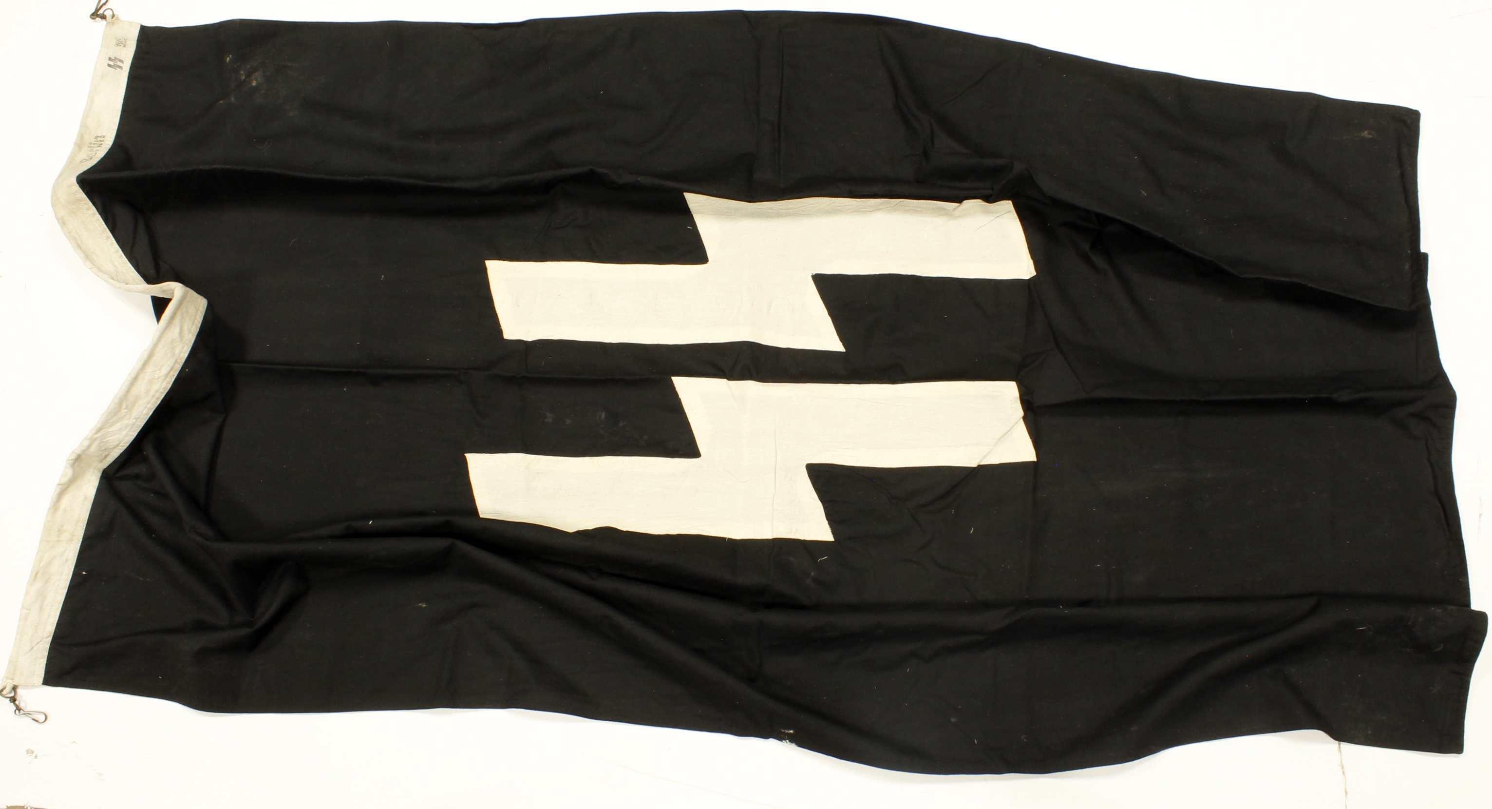 German SS banner with inspectors stamps to the lanyard with hanging hooks.