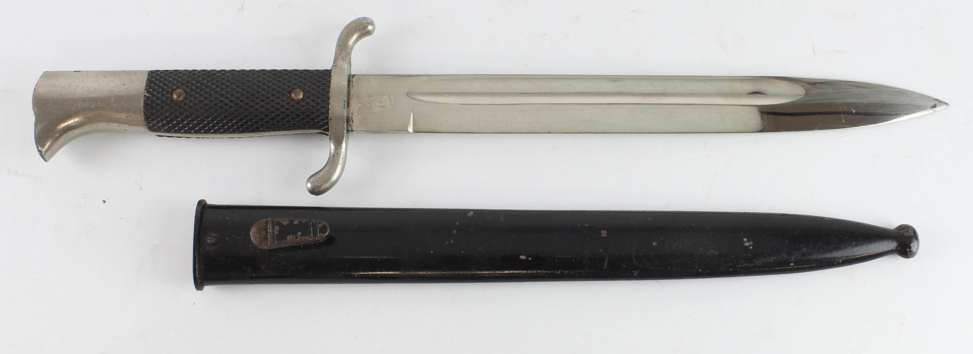 German WW2 Fireman’s dress dagger blade maker marked WKC in its black painted scabbard.