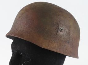 German Paratrooper steel helmet. Rough camo finish. Complete with liner & chin strap.