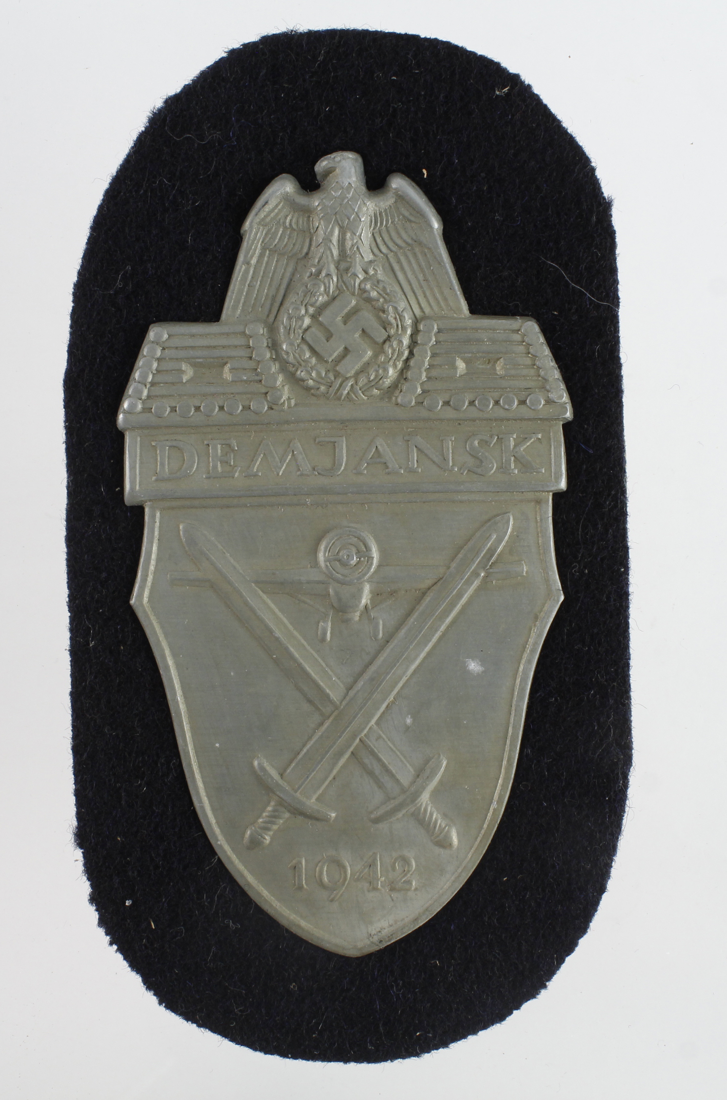 German WW2 DEMJANSK arm shield unissued.