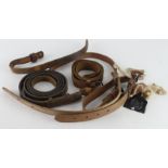 Leather military straps WW1 and WW2 dated with sealed pattern labels.