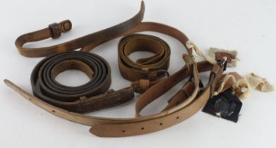 Leather military straps WW1 and WW2 dated with sealed pattern labels.