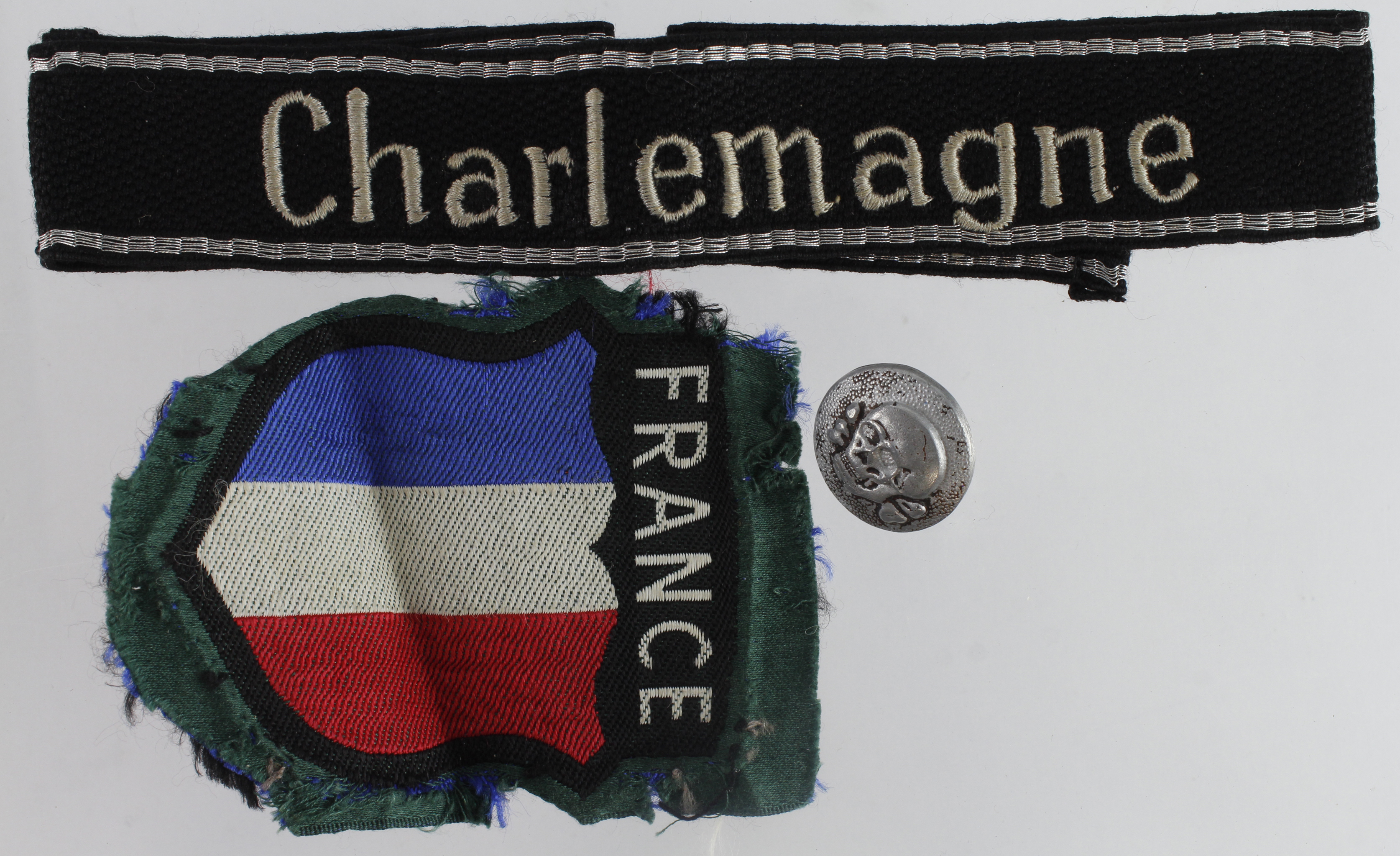 German Waffen SS button, French Arm Shield Bevo and Cuff band "Charlemagne".