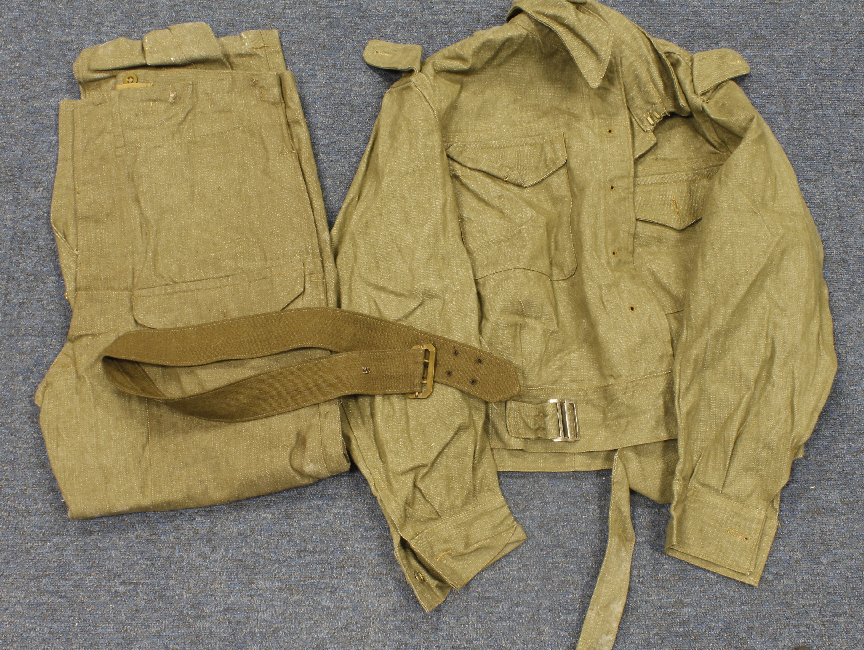 WW2 scarce denim Battle dress blouse and trousers and both dated 1945. Trousers waist 34” to 35”,