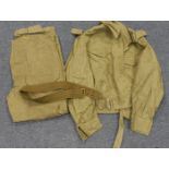 WW2 scarce denim Battle dress blouse and trousers and both dated 1945. Trousers waist 34” to 35”,