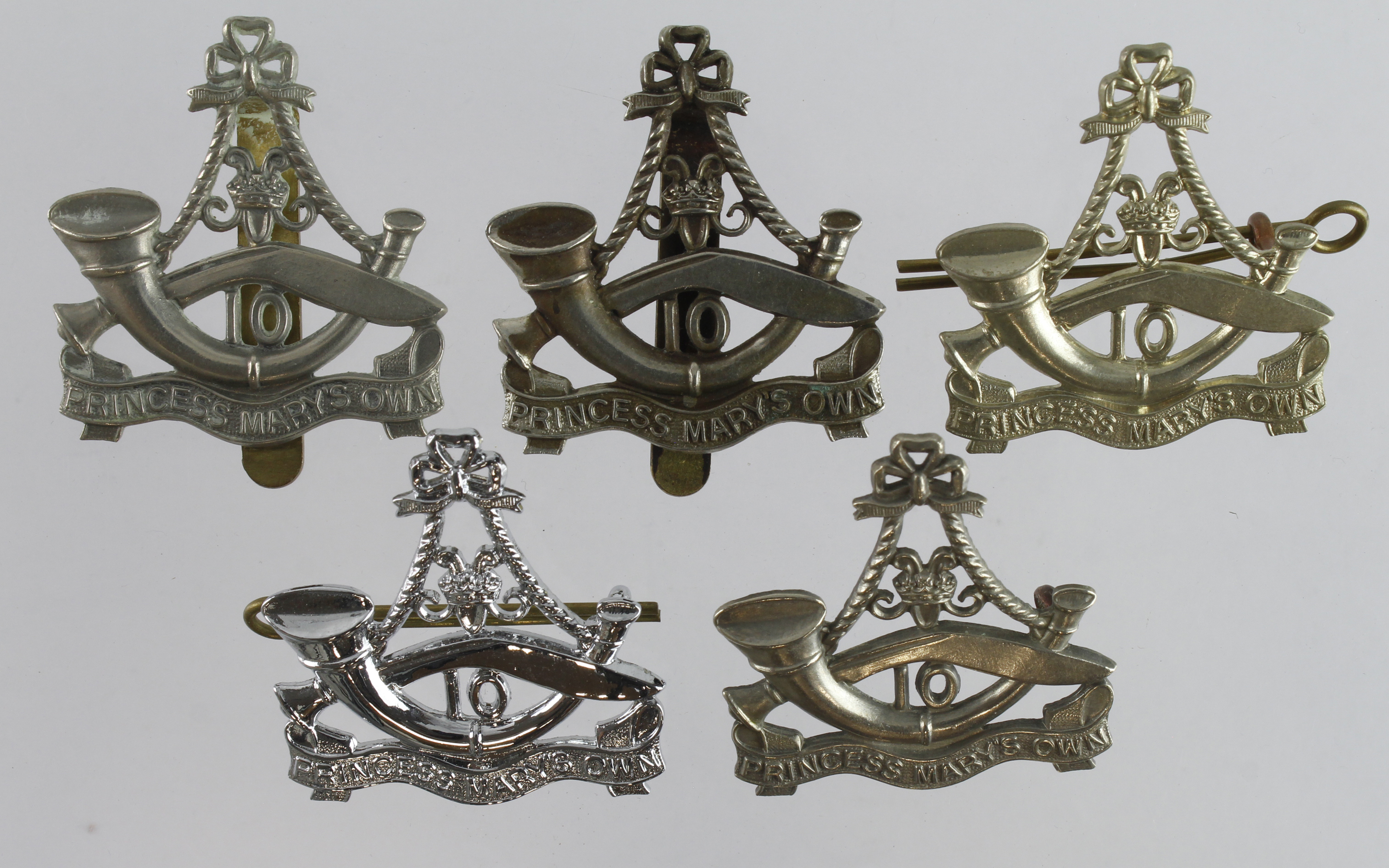 Badges five of including Princess Marys own 10th Gurkha Rifles all with sliders and lugs.