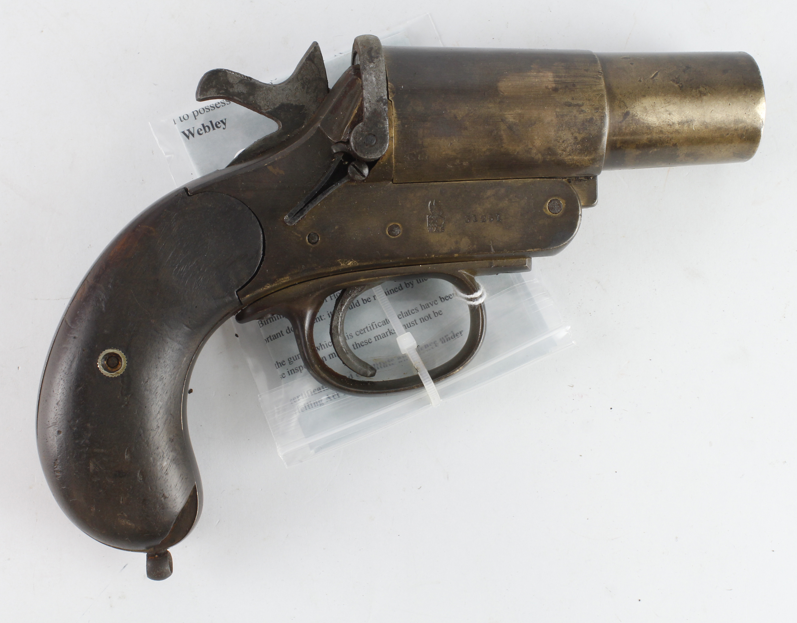 Great War Signal Pistol, Webley MkIII, 1" Calibre, barrel 4". Brass construction, original wooden
