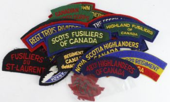 Badges a bag of cloth Canadian shoulder titles etc.