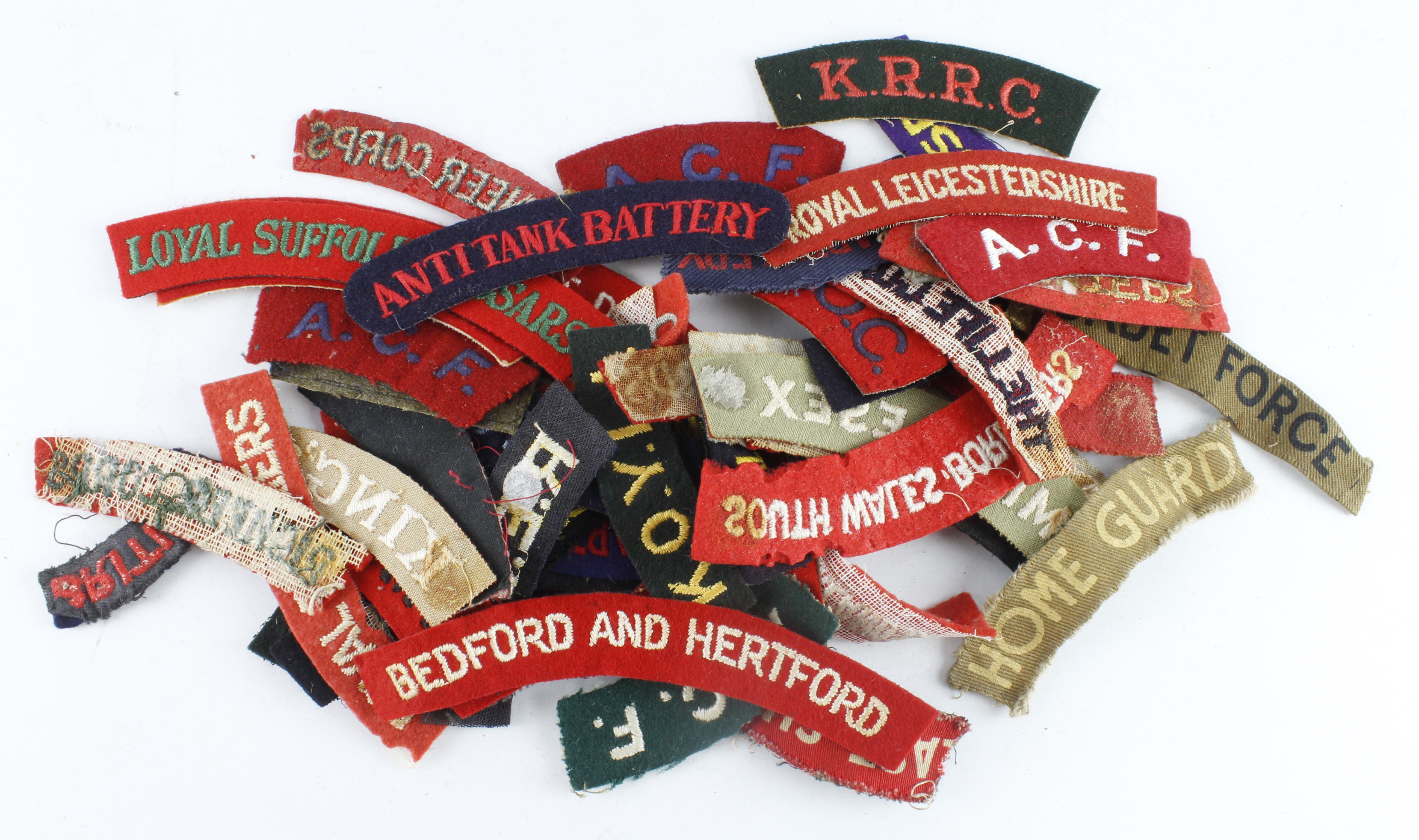 Cloth Badges: British Army shoulder title badges including embroidered, paste back, and printed