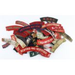 Cloth Badges: British Army shoulder title badges including embroidered, paste back, and printed