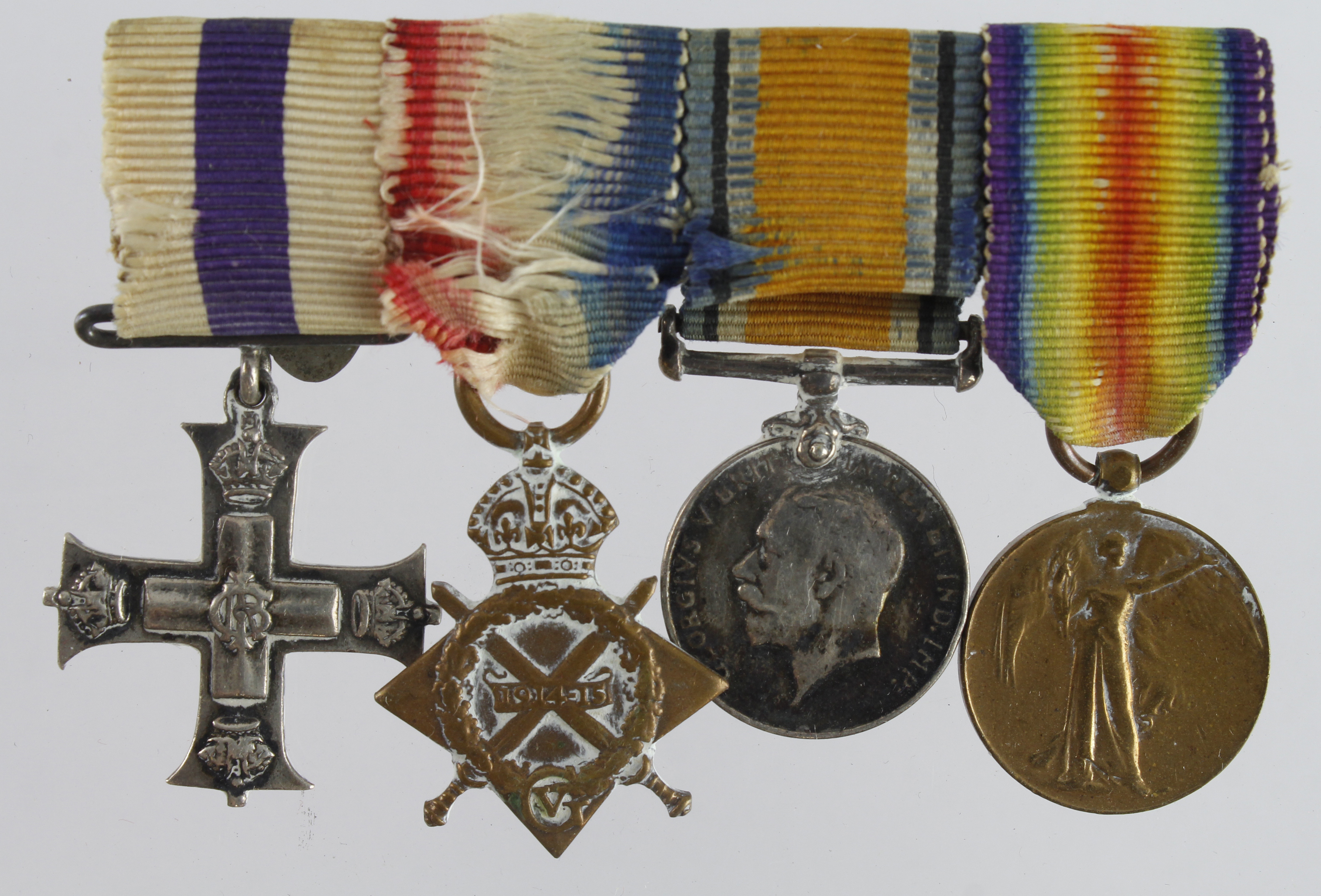 Minature Medal group mounted as worn - Military Cross GV, 1915 Star Trio (4)