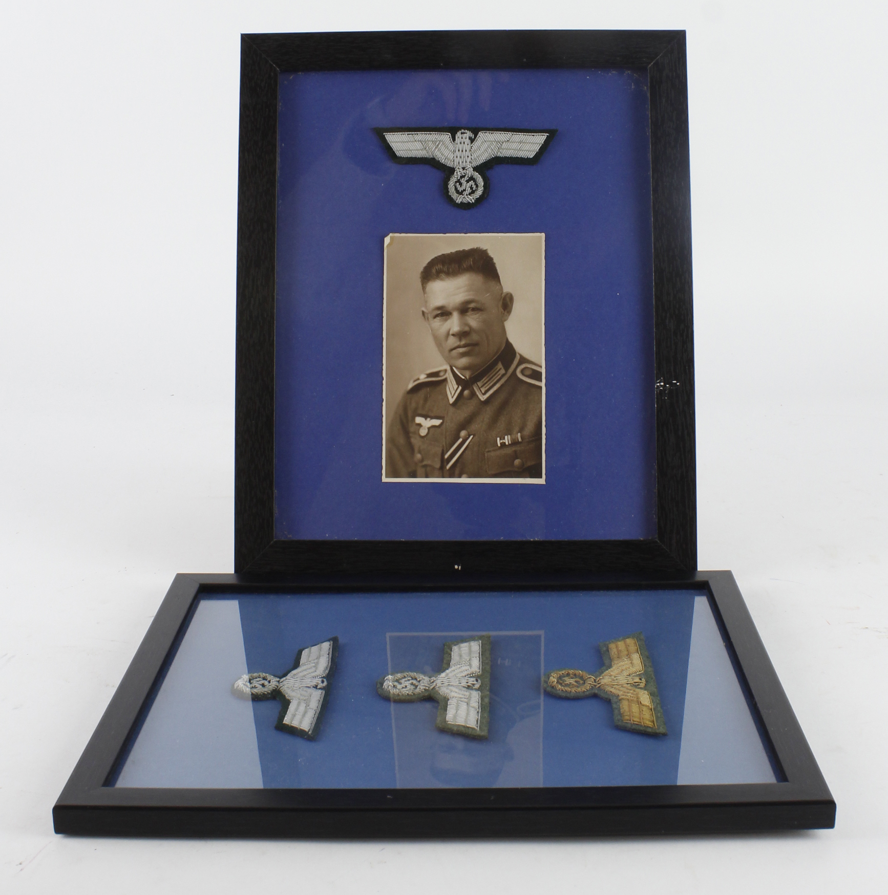 German framed set of officers breast eagles with framed German officers photo with eagle above.