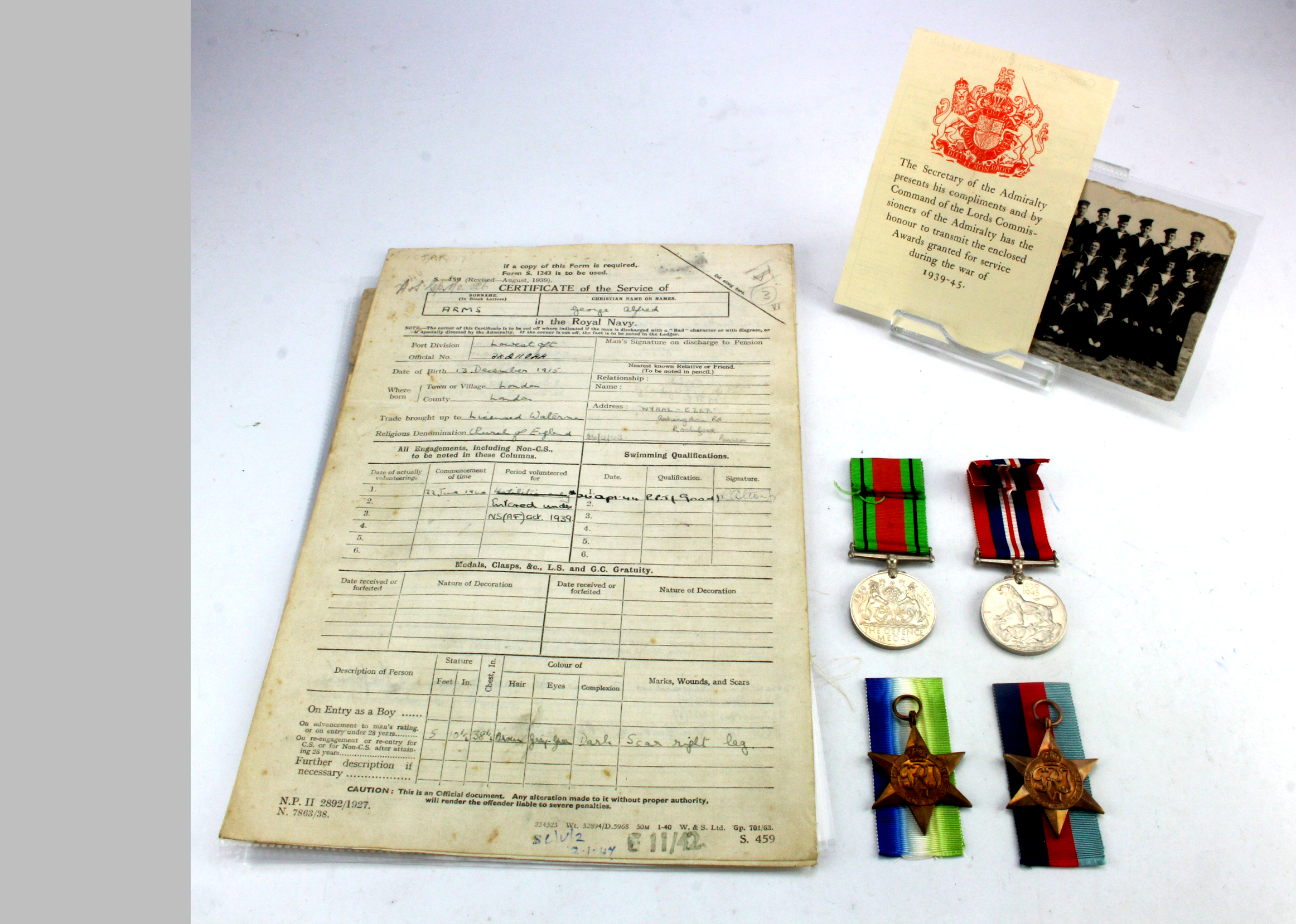 RAF WW2 pilots log book to Sgt C G Salt with his war medal and two portrait photos, US navy flight