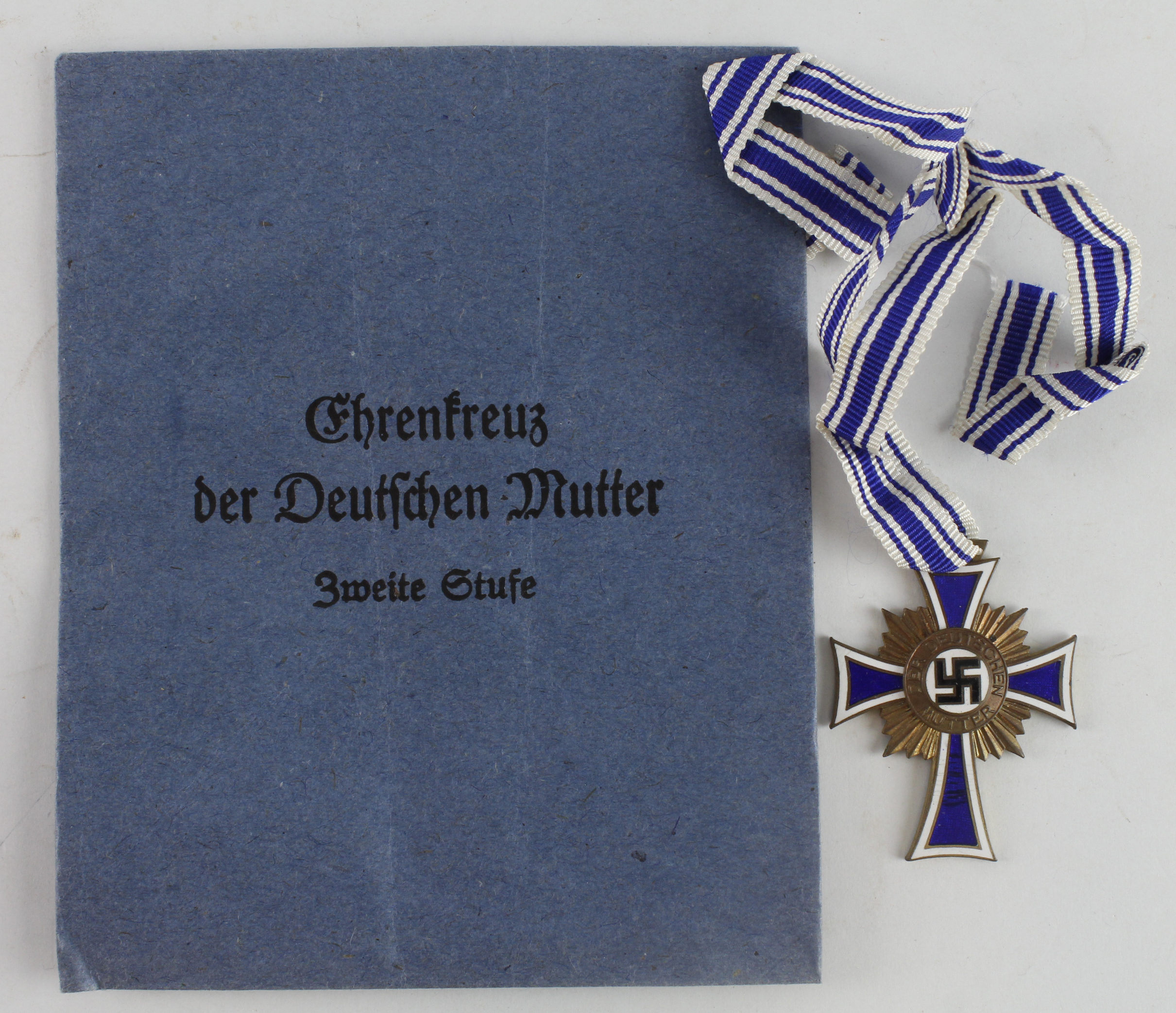 German Mothers cross in bronze in packet of issue.