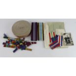 Medal ribbons various including Air Crew Europe, and a large roll of WW1 miniature trio ribbon as