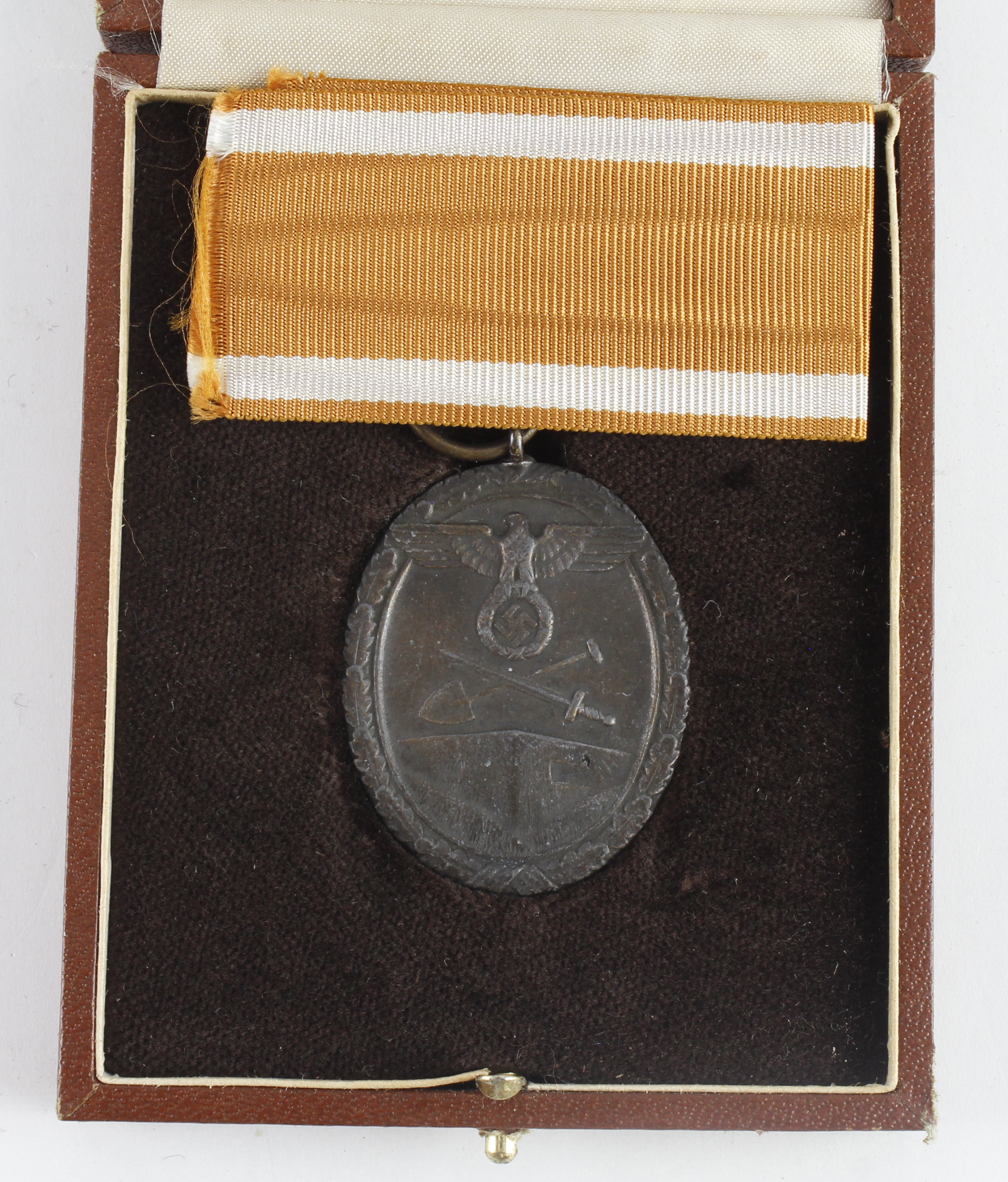 Germany from a one owner collection, a Westwall medal in fitted Deluxe box.