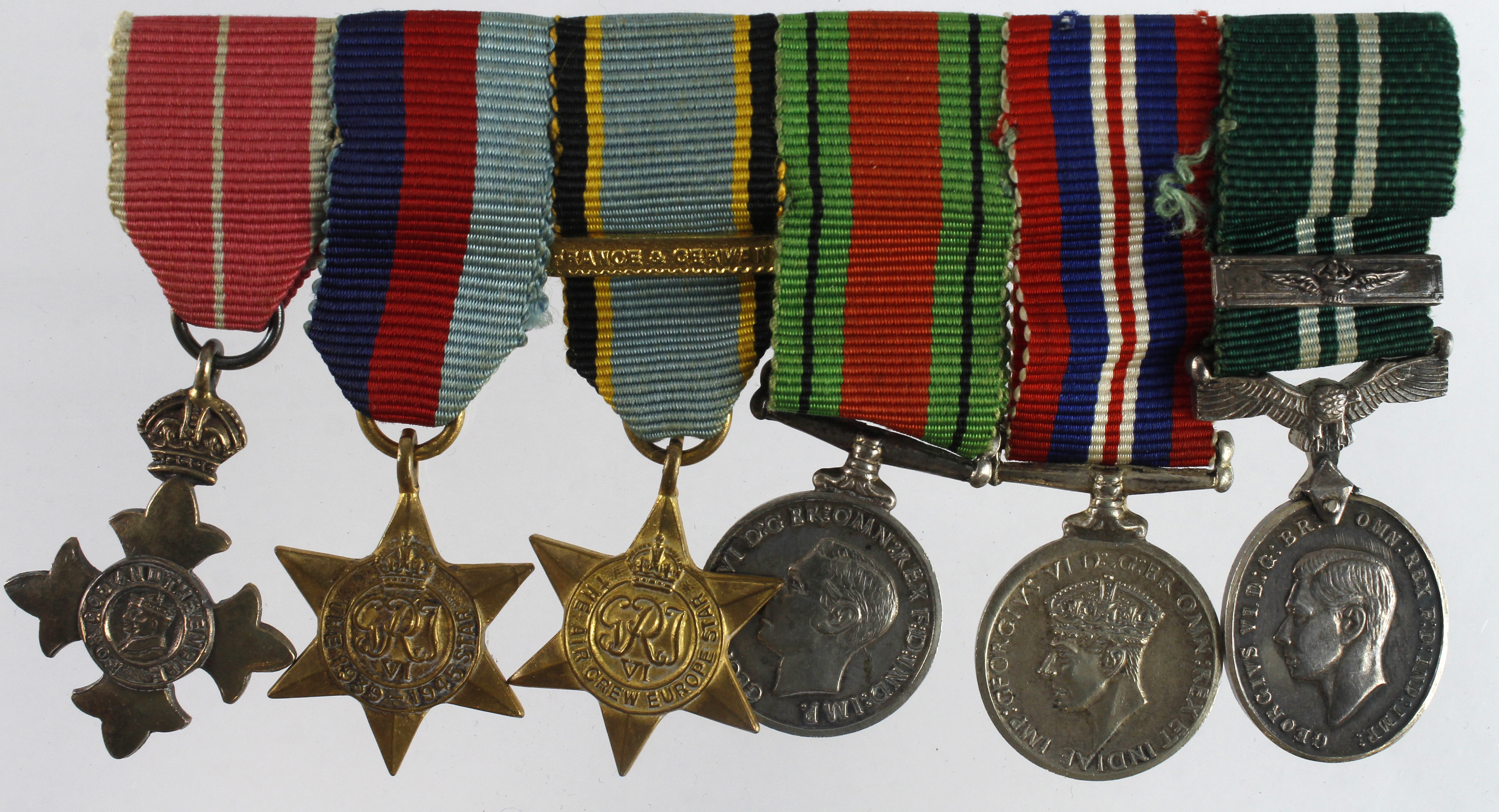 Minature Medal group mounted as worn - OBE (Mily) 1939-45 Star, Air Crew Europe Star + France &