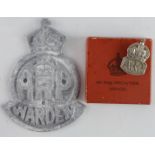 ARP badge in box with ARP whistle and wardens door plaque.