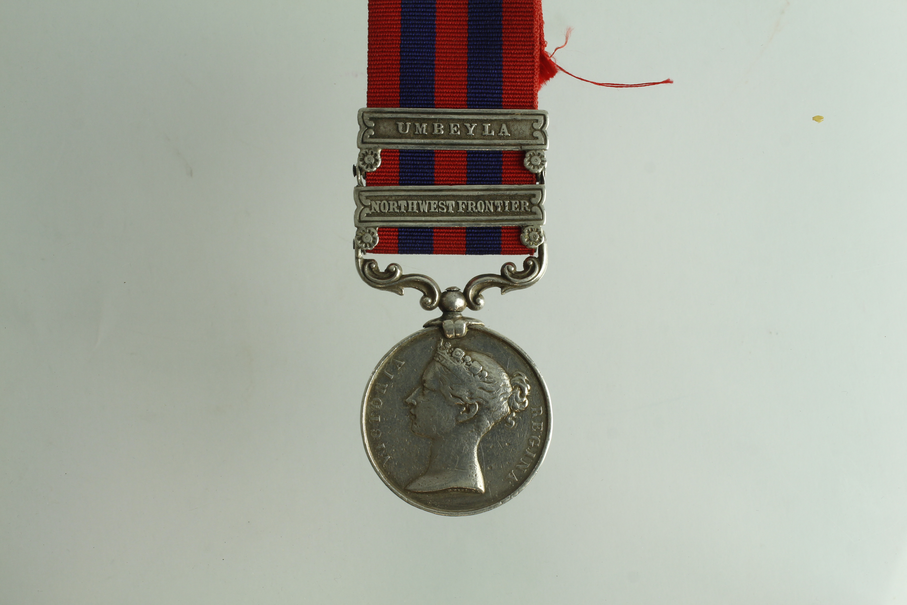 IGS 1854 with bars North West Frontier / Umbeyla, naming worn, medal worn overall and re clasped.